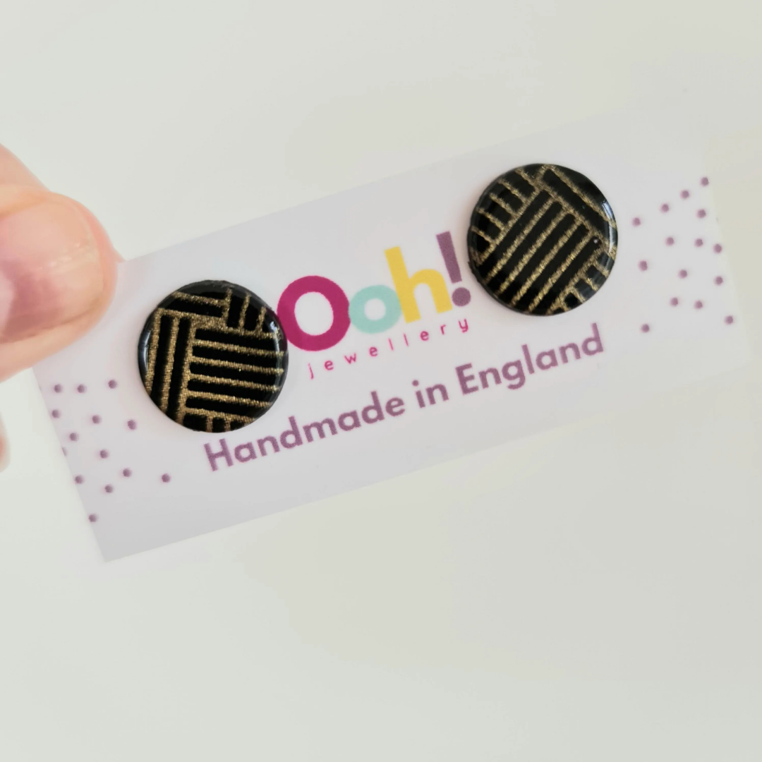Black & gold round studs