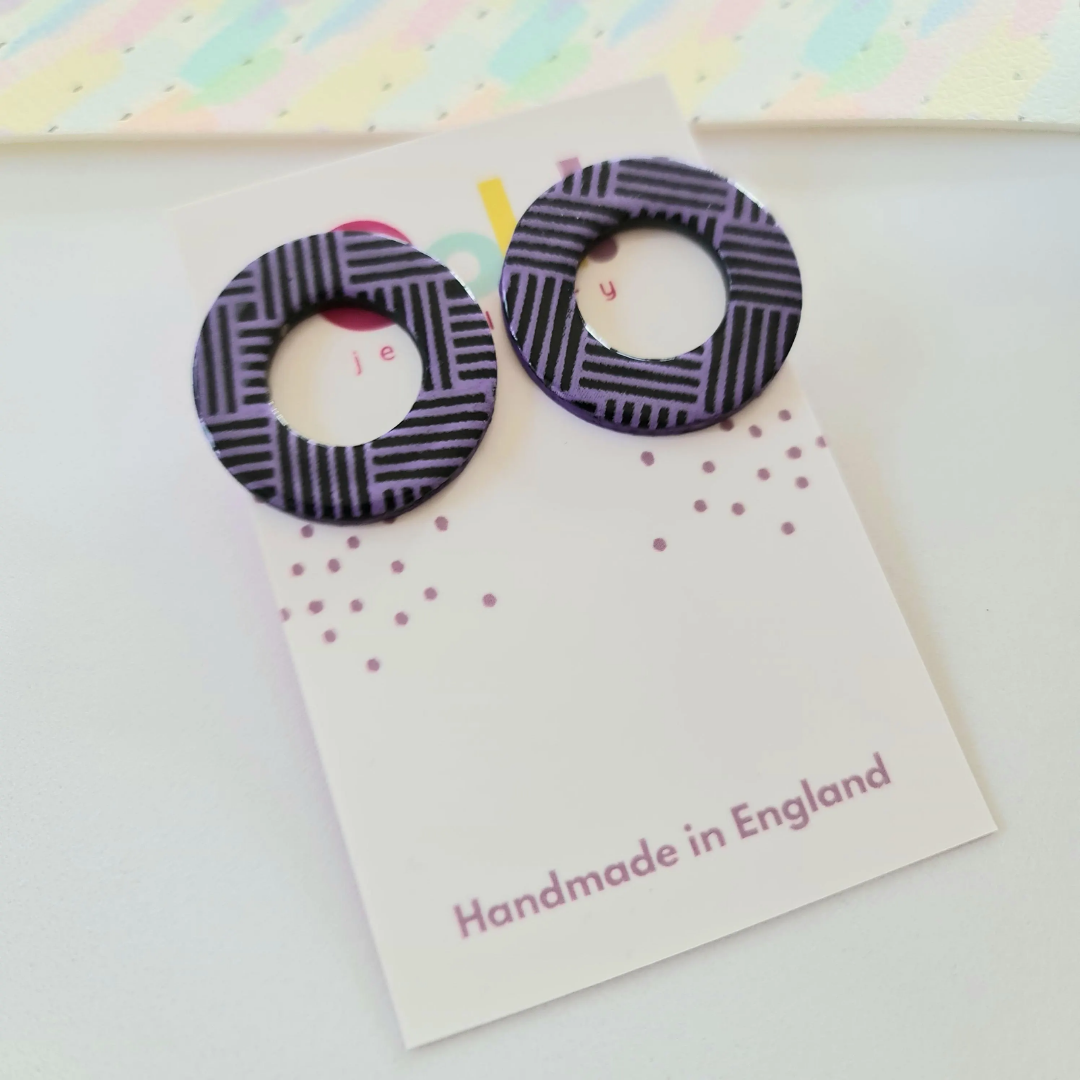 Black & purple doughnut shaped statement studs