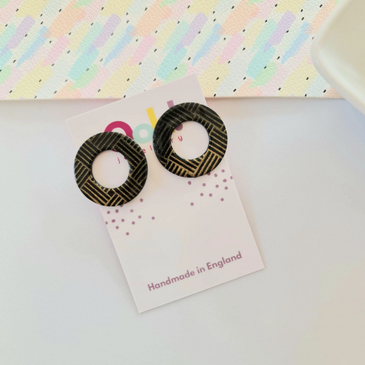 Black & gold statement studs