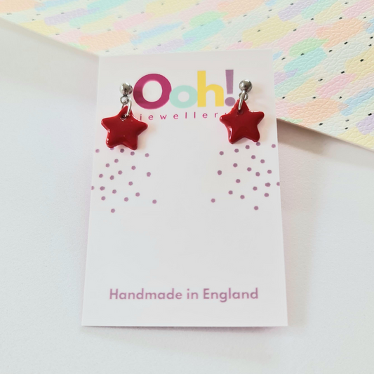 Red mini star drop earrings