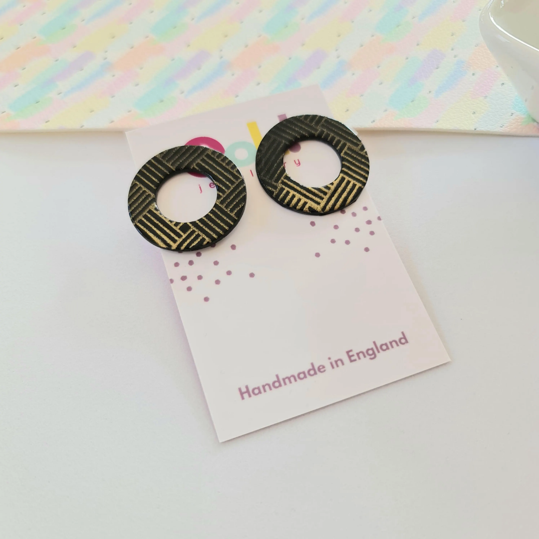 Black & gold statement studs