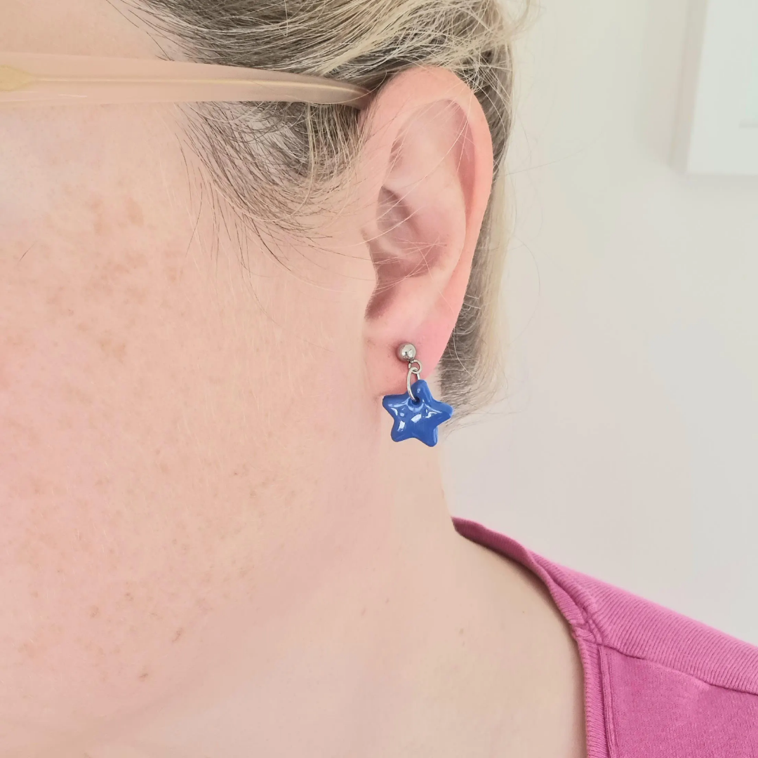 Blue mini star drop earrings