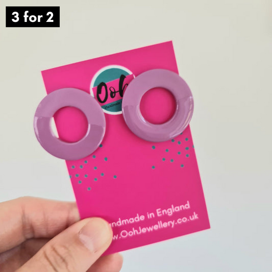 Purple doughnut shaped statement studs